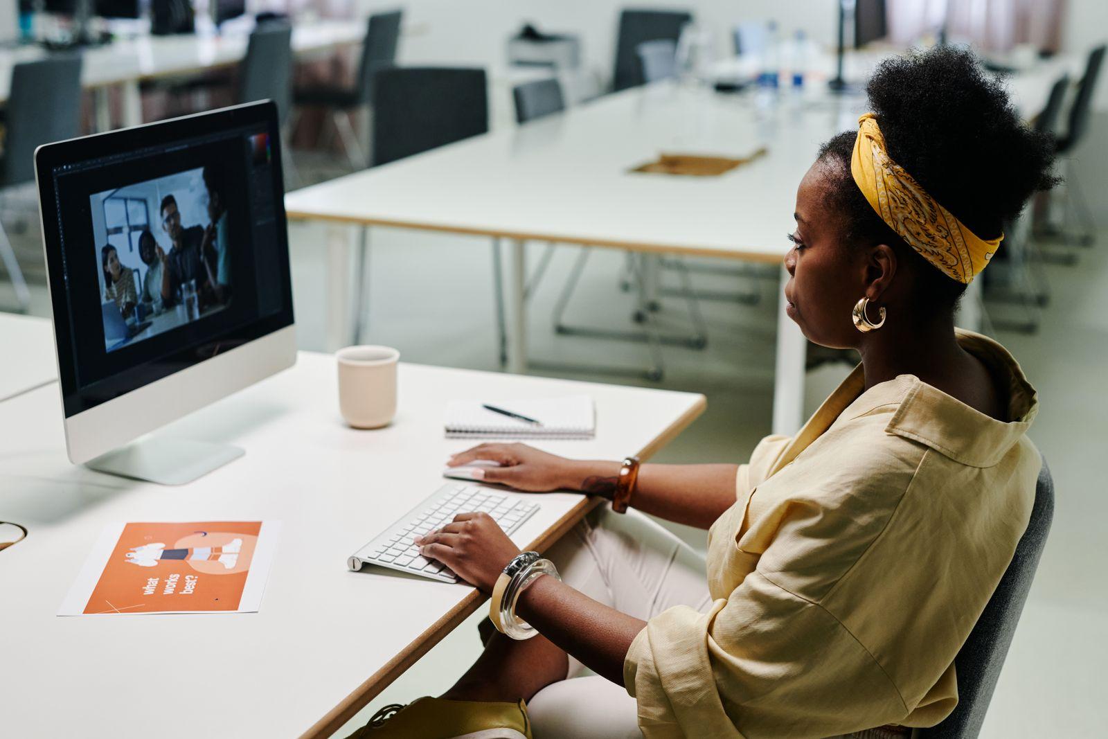 A designer editing visuals on a computer