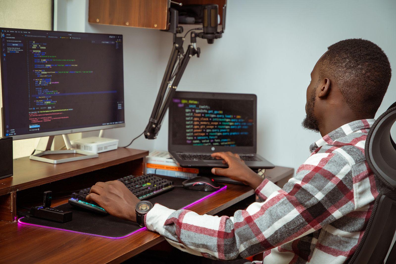 A developer writing code in an office